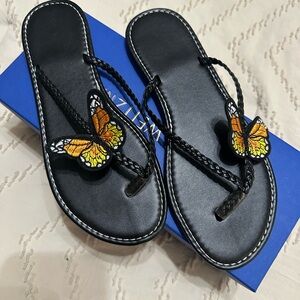 Fashion Nova Black Braided Sandals with Orange Butterfly Accent